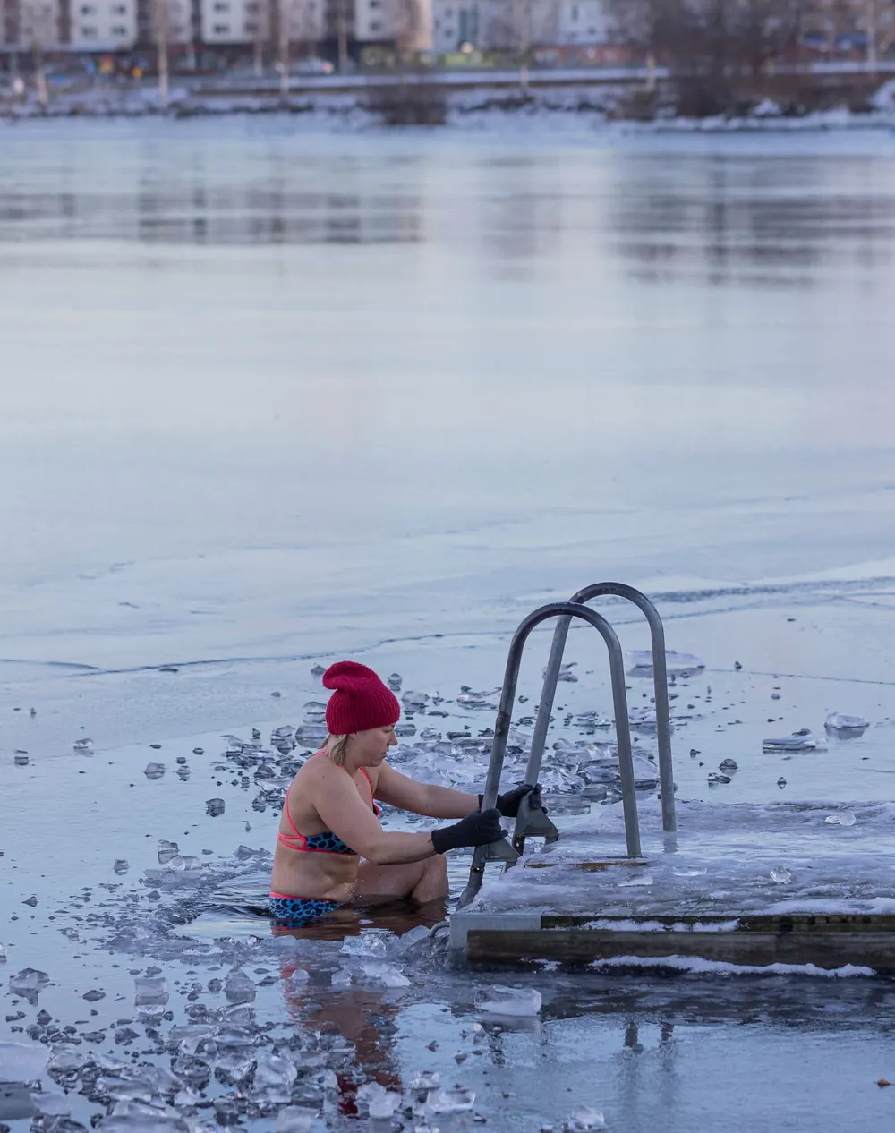 Woman in icy water, illustrating a cold plunge at home